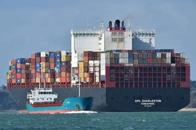 A container ship leaves Southampton