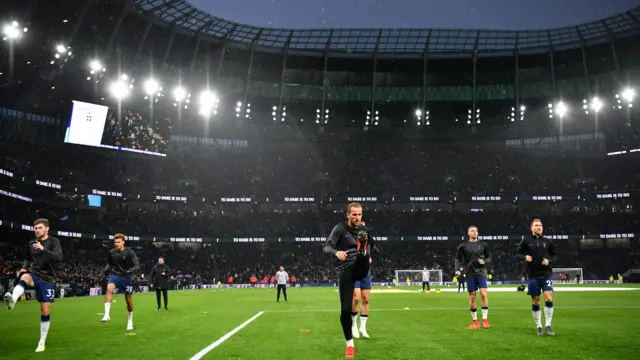 Harry Kane and his Spurs team-mates warm up