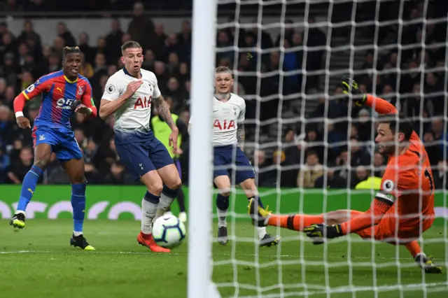 Hugo Lloris saves from Wilfried Zaha