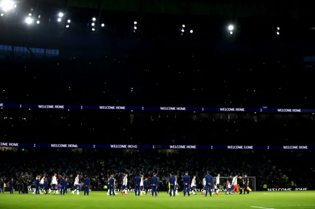 Players walk out at Tottenham