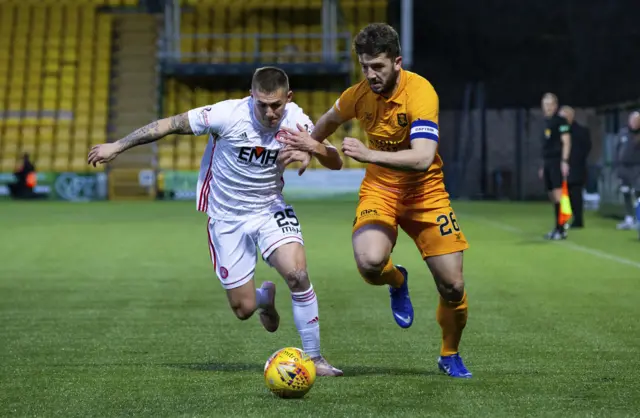 Craig Halkett in action for Livingston