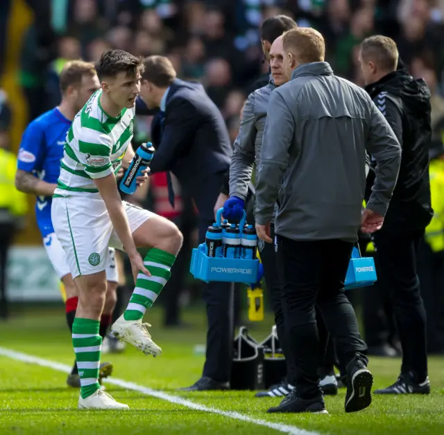 Kieran Tierney and Neil Lennon during Sunday's win over Rangers