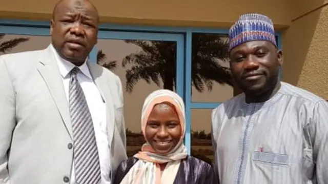 Zainab Aliyu (C) with Nigerian officials in Jeddah, shortly after her release from prison.