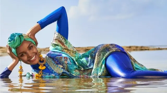 Halima Aden poses in her burkini