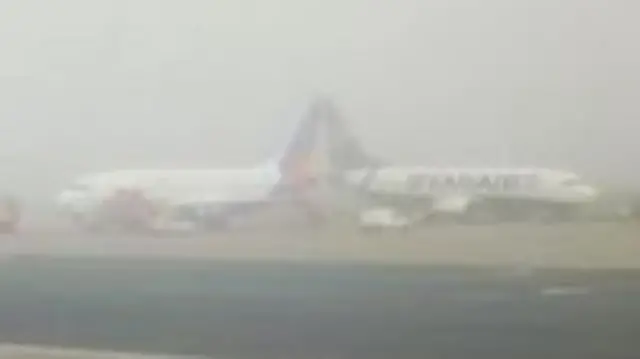 Two planes close together at East Midlands Airport