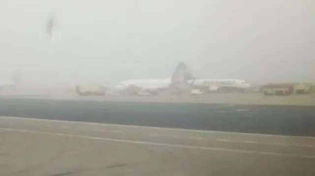 Two planes close together at East Midlands Airport