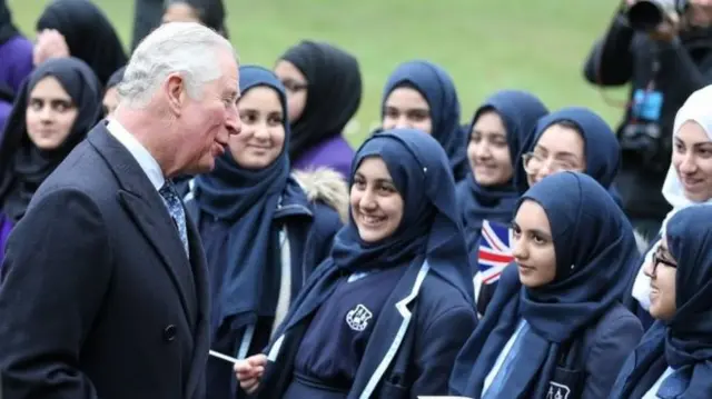 The Prince of Wales was greeted by schoolchildren at the British Muslim Heritage Centre