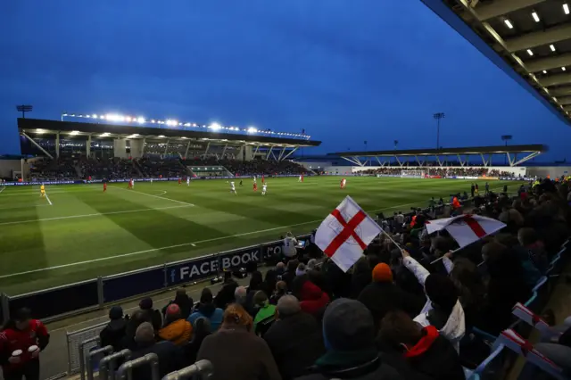 Fans in the Academy Stadium