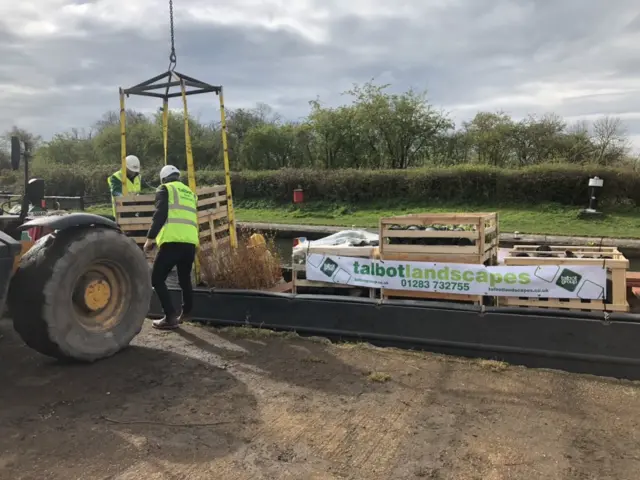 Narrowboat loaded up with cargo