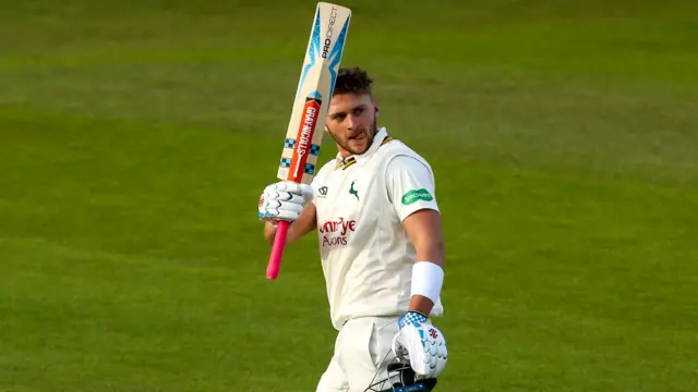 Joe Clarke celebrates