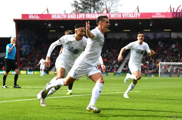 Ashley Westwood celebrates