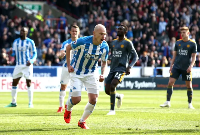 Aaron Mooy celebrates