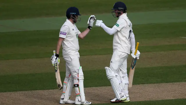 Sam Northeast (right) is congratulated by partner Liam Dawson