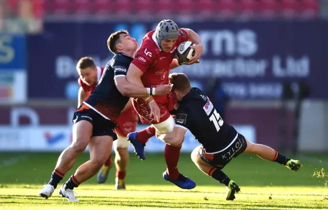 Jonathan Davies is tackled