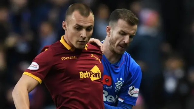 Motherwell's Liam Grimshaw and Rangers' Andy Halliday