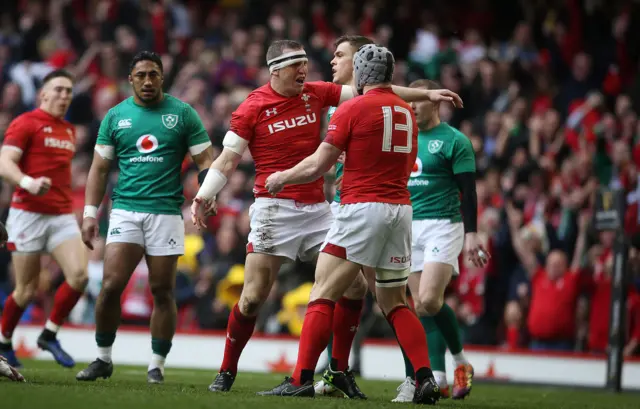 Hadleigh Parkes and Jonathan Davies celebrate the former's try for Wales against Ireland