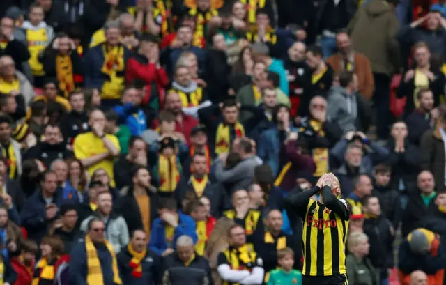 Jose Holebas reacts during the match