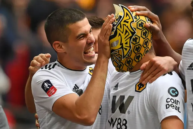 Connor Coady and Raul Jimenez celebrate the Mexican's goal