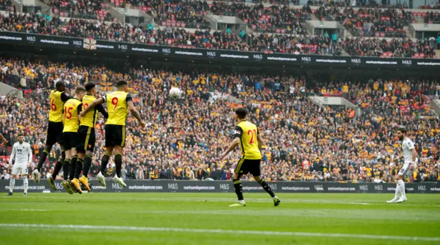 Joao Moutinho shoots at goal from a free-kick