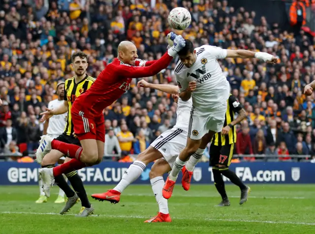 Watford's Heurelho Gomes in action with Wolverhampton Wanderers' Raul Jimenez