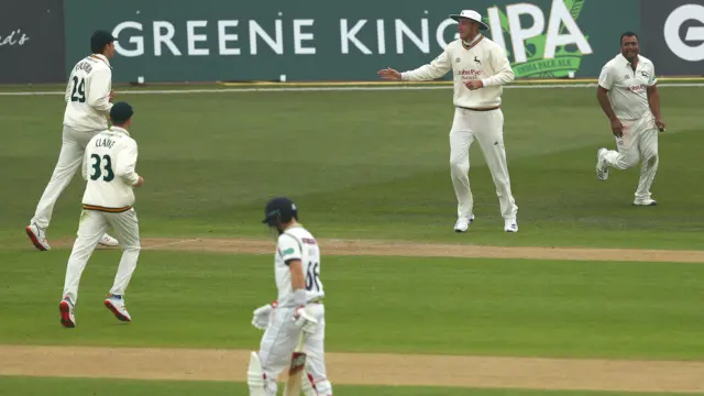 Yorkshire's Joe Root walks off after getting out as Notts celebrate