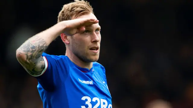 Rangres midfielder Scott Arfield celebrates his goal