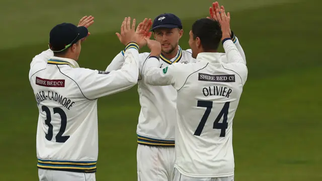 Joe Root celebrates with Duanne Olivier