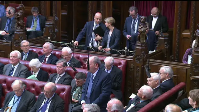 Yvette Cooper (centre-back) watches on in the Lords