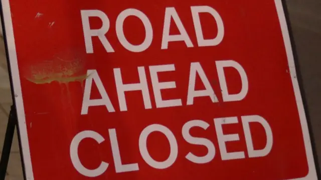 A road closed sign