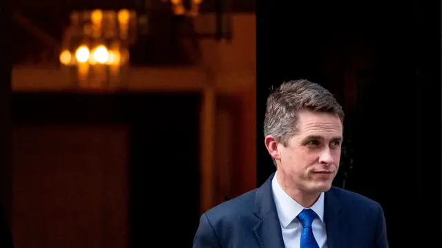 Gavin Williamson leaving Downing Street