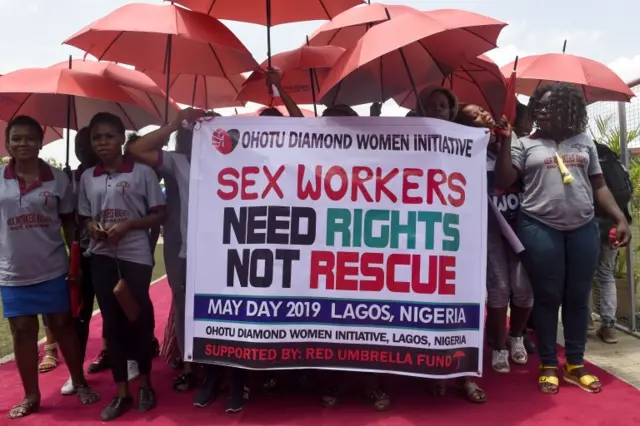 People holding a banner