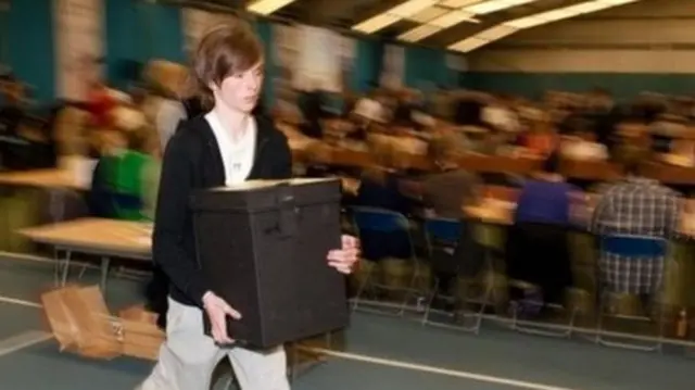 A woman with a ballot box