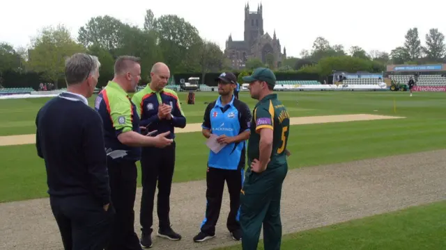 Players and match officials ahead of the match