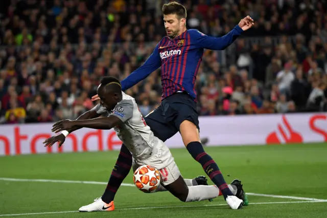 Gerard Pique and Sadio Mane