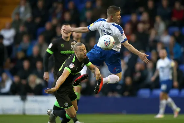 Tranmere Rovers' Jay Harris (right) and Forest Green Rovers' Joseph Mills