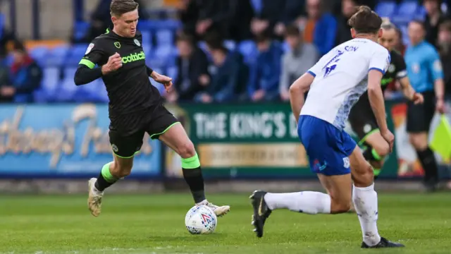 Forest Green Rovers' Dayle Grubb runs forward