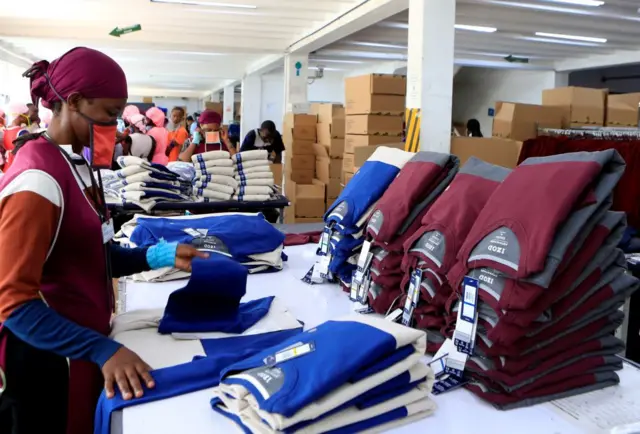 Woman in a clothes factory