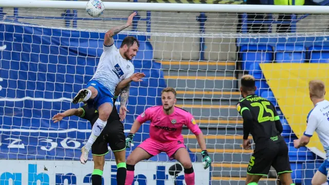 Forest Green Rovers Liam Shephard(2) and Tranmere Rovers James Norwood(10) jump for the ball