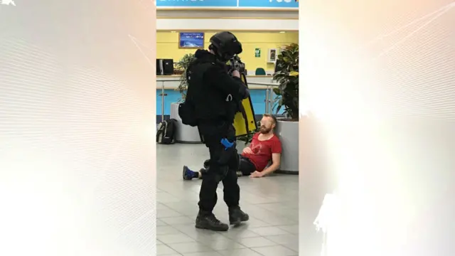 An armed officer takes part in the training exercise