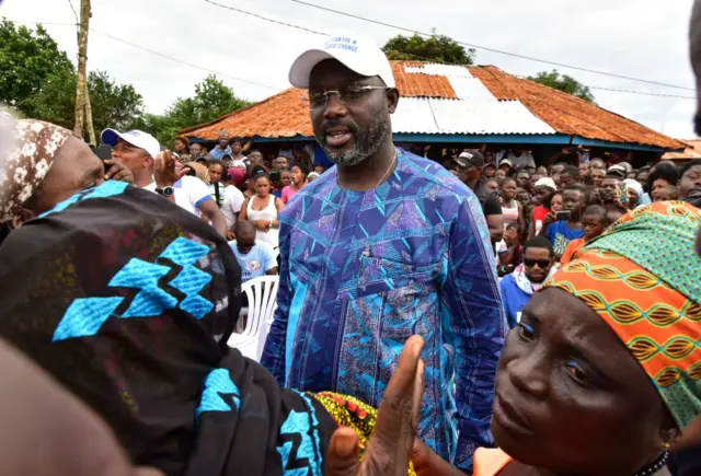 George Weah with supporters (archive shot)