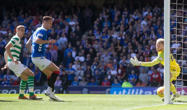 Celtic goalkeeper Scott Bain looks on as James Tavernier's free-kick finds the far corner of the net