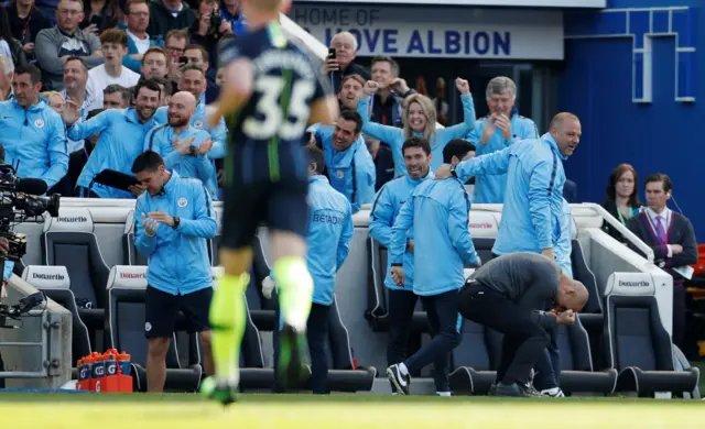 Pep Guardiola and team celebrate