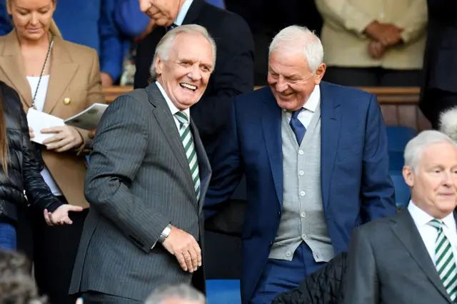 Former Celtic manager Davie Hay shares a joke with former Rangers boss Walter Smith