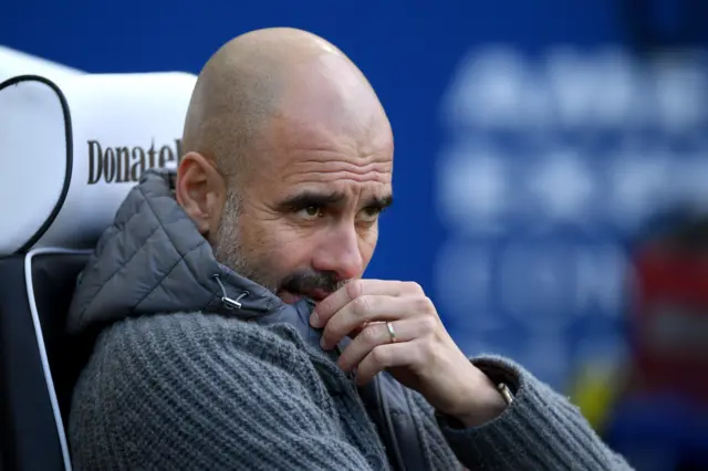 pep Guardiola on the bench at Brighton