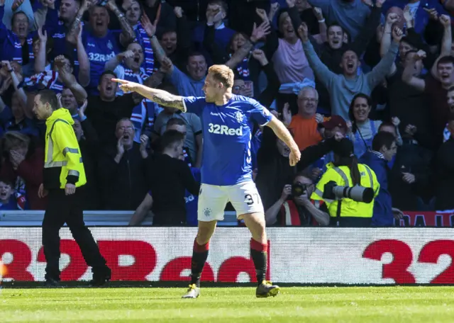 Scott Arfield celebrates