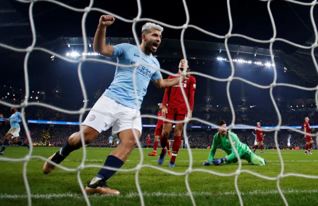 Sergio Aguero scores against Liverpool at the Etihad Stadium