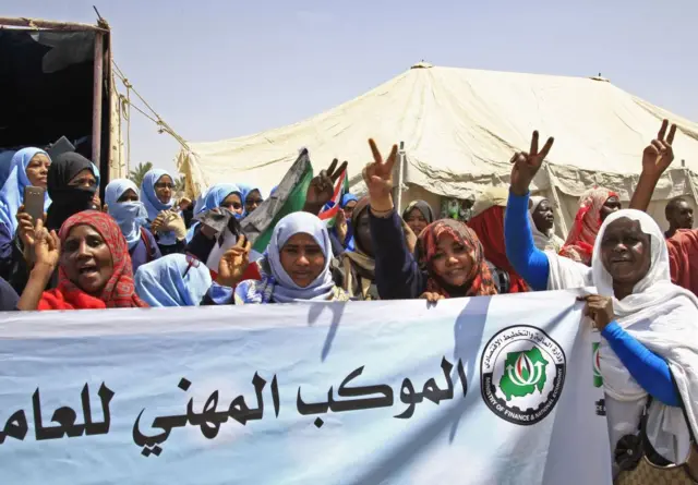 Sudanese women take part in a sit-in outside Sudan's army headquarters in Khartoum