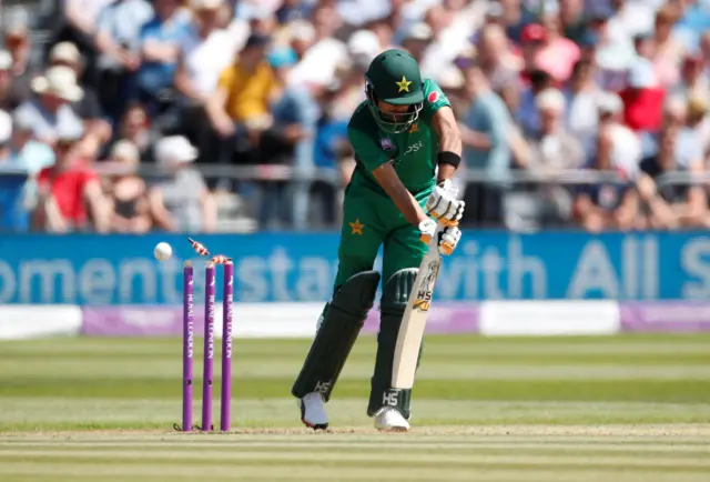 Pakistan's Babar Azam is bowled by England's Chris Woakes