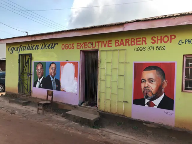 A presidential barber shop displaying portraits of the presidential candidates