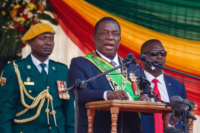 Zimbabwe's President Emmerson Mnangagwa speaks during the Defence Forces Day celebrations held at the National Sports Stadium in Harare on August 14, 2018